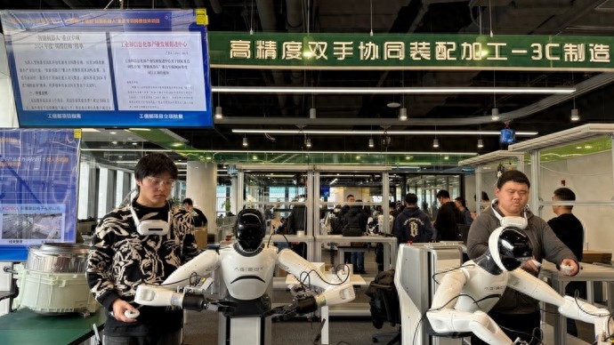 pg电子娱乐平台 超100个人形机器人可同时训练 全国首个异构人形机器人训练场启用